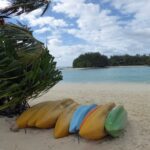 Kayaks lined up by the Muri Lagoon, Rarotonga.