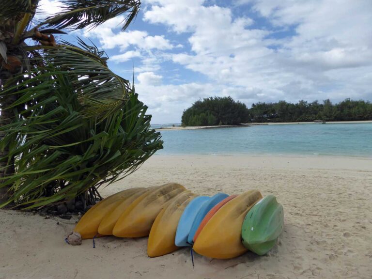 Kayaks lined up by the Muri Lagoon, Rarotonga.