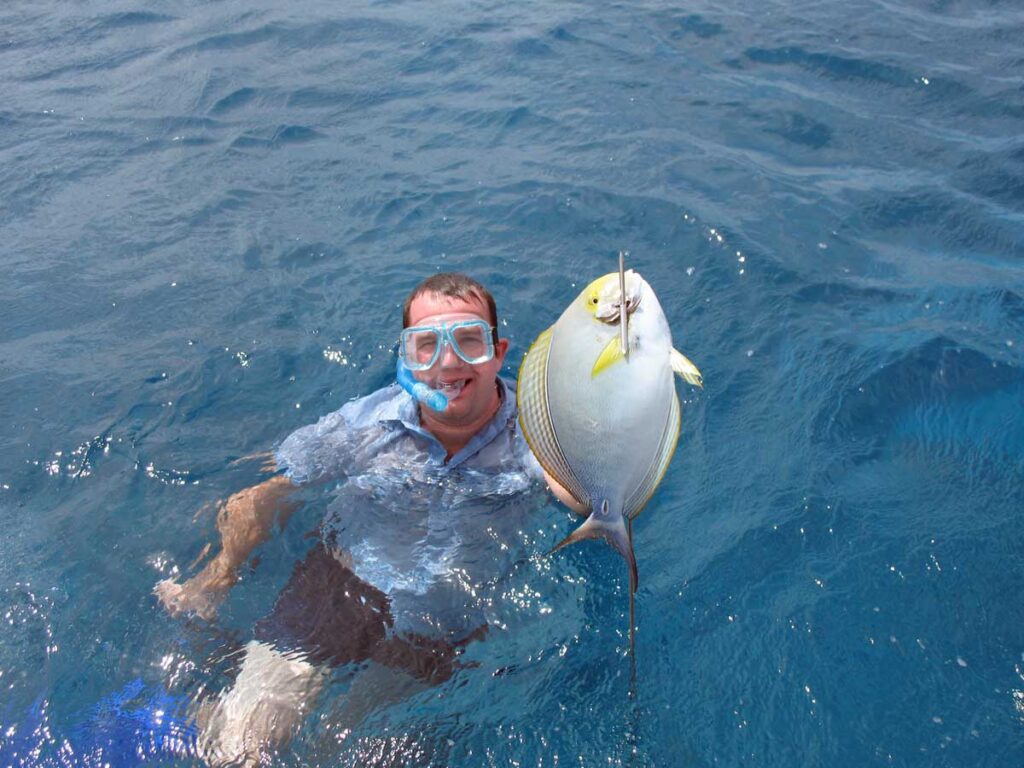 Spear fishing on Aitutaki, the Cook Islands.
