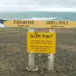 Sign at Slope Point on New Zealand's Catlins Coast.