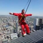 Leaning over the edge on the CN Tower Edgewalk in Toronto.