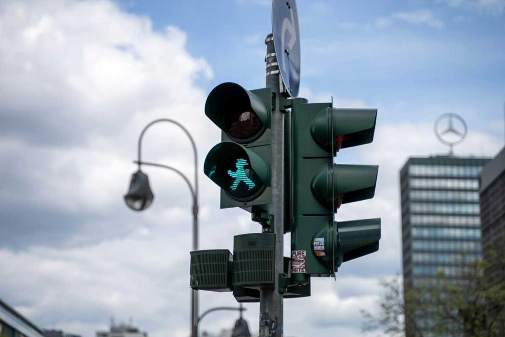 The Amplemann on a traffic light in Berlin, Germany.