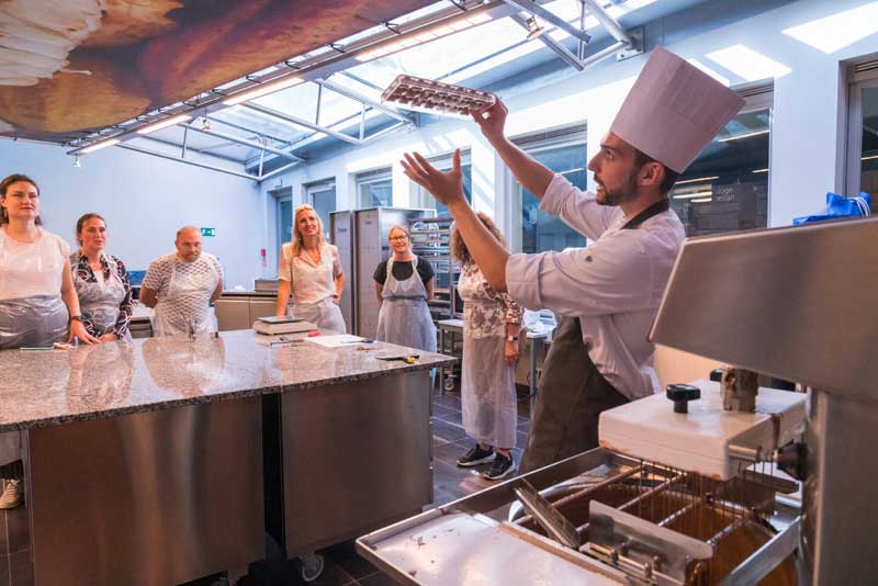 A chocolate-making demonstration at Choco-Story Bruges.