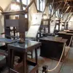 Centuries-old printing presses at the Plantin-Moretus Museum in Antwerp, Belgium.