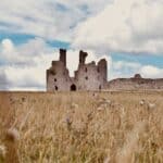 Dunstanburgh Castle in Northumberland, North-East England.