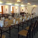 The dining room inside the Royal Yacht Britannia, Edinburgh.
