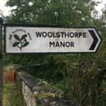 Sign to Woolsthorpe Manor, Lincolnshire.